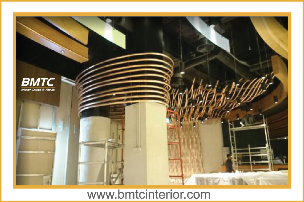 Electrical wiring installation with conduit and cable routing in ceiling void