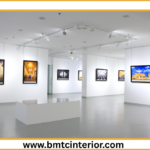 Here are a few options for ALT text for your image, ranging in descriptiveness. Choose the one that best suits the specific visual content of the `Exhibition-Design.png` file: **Option 1 (Concise & Direct):** > Exhibition stand design in Oman, showcasing custom builds and brand experiences. **Option 2 (More Descriptive, focusing on impact):** > A high-impact custom exhibition stand designed in Oman, featuring innovative branding and engaging visitor experiences. **Option 3 (If the image shows a specific element):** > Close-up of a modern exhibition stand in Oman, highlighting intricate custom design and strong brand presence. **Option 4 (If the image shows a wide view of the stand):** > A panoramic view of a professionally designed exhibition stand in Oman, demonstrating creative brand storytelling and impactful visual elements. **Option 5 (If the image clearly shows the Omani context or cultural elements):** > Striking exhibition stand design in Oman, blending contemporary aesthetics with local influences for a memorable brand experience. **Key considerations when choosing:** * **What is the actual image showing?** Is it a wide shot of a whole stand, a close-up of a specific feature, a rendering, or a photo of a completed stand? * **What is the most important takeaway from the image for someone who can't see it?** * **Does the image directly illustrate the "high-impact custom stands & brand experiences" mentioned in the post title?** **Recommendation:** For a general post title like "Exhibition Design in Oman: Creating High-Impact Custom Stands & Brand Experiences," **Option 2** is often a good balance of detail and conciseness. If the image is particularly visually stunning and showcases a specific aspect, you might lean towards **Option 3** or **Option 4**.