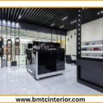 Here are a few options for descriptive ALT text, ranging from concise to more detailed, for your image: **Concise & Informative:** * "Modern retail interior design in Muscat, Oman, for a growing business." * "Commercial retail space in Muscat showcasing contemporary design for business growth." **More Descriptive (Focus on Visuals - assume the image shows a sleek, modern retail space):** * "A bright and spacious retail interior in Muscat, Oman, featuring clean lines, modern fixtures, and ample display areas, designed for a growing business." * "Professional commercial retail design in Muscat, highlighting a welcoming and stylish storefront with contemporary shelving and lighting, tailored for business expansion." * "Interior of a modern retail store in Muscat, Oman, with a focus on customer experience and product display, reflecting growth and sophistication." **Most Detailed (If the image has specific elements you want to highlight):** * "A contemporary retail interior design in Muscat, Oman, showcasing polished concrete floors, minimalist shelving units, and warm accent lighting, creating an inviting atmosphere for a growing business." * "Elegant commercial retail space in Muscat, featuring a well-lit product display area with sleek furniture and a clean aesthetic, designed to support the expansion of a growing business." **When choosing, consider:** * **What is the *primary* message of the image?** Does it emphasize the modernity, the spaciousness, the product display, or the overall atmosphere? * **What would someone *not seeing the image* need to know to understand its context?** * **Keep it relatively concise** for accessibility, but descriptive enough to be useful. **Recommendation:** For a general post like this, I'd lean towards one of the **More Descriptive** options, as they provide a good balance of detail and conciseness. For example: **"A bright and spacious retail interior in Muscat, Oman, featuring clean lines, modern fixtures, and ample display areas, designed for a growing business."**