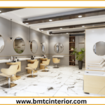 Modern commercial salon interior design in Muscat featuring spacious styling stations and elegant waiting area.