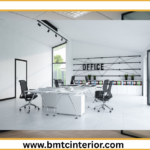 Here are a few options for descriptive ALT text for the image, catering to slightly different focuses, along with explanations for why they work: **Option 1 (Focus on the overall impression):** > **ALT text:** Modern and inviting Muscat office interior with natural light, comfortable seating, and elegant desk spaces, designed to impress clients. * **Why it works:** * **"Modern and inviting Muscat office interior"**: Clearly states the subject and location. * **"natural light, comfortable seating, and elegant desk spaces"**: Highlights key visual elements that contribute to the "impressive" aspect. * **"designed to impress clients"**: Directly connects the visual to the post's theme. **Option 2 (More detail, assuming specific elements are prominent):** > **ALT text:** Sleek and professional office reception area in Muscat, featuring a stylish accent wall, contemporary furniture, and subtle branding, creating a memorable client experience. * **Why it works:** * **"Sleek and professional office reception area in Muscat"**: More specific about the part of the office shown. * **"stylish accent wall, contemporary furniture, and subtle branding"**: Describes specific design features that are likely to be visually striking. * **"creating a memorable client experience"**: Reinforces the post's objective. **Option 3 (Concise and impactful):** > **ALT text:** Impressive Muscat office design showcasing a sophisticated workspace with ample light and modern furnishings. * **Why it works:** * **"Impressive Muscat office design"**: Gets straight to the point and uses strong adjectives. * **"sophisticated workspace with ample light and modern furnishings"**: Provides key visual details concisely. **Option 4 (If the image focuses on a specific area like a meeting room):** > **ALT text:** A well-lit and contemporary meeting room in a Muscat office, featuring a large conference table, ergonomic chairs, and subtle decorative elements for client presentations. * **Why it works:** * **"well-lit and contemporary meeting room in a Muscat office"**: Specific about the room type and location. * **"large conference table, ergonomic chairs, and subtle decorative elements for client presentations"**: Details elements relevant to client interaction. **Key considerations when choosing:** * **What is the *most* important visual element in the image?** Does it showcase a reception area, a collaborative space, individual workstations, or a meeting room? * **What feeling does the image evoke?** Is it luxurious, minimalist, warm, energetic? * **How does the image directly relate to the post's title?** Make sure the ALT text reinforces the idea of "impressing clients." **In summary, the best ALT text will be:** * **Descriptive:** It tells someone who can't see the image what it looks like. * **Concise:** It's not overly long. * **Relevant:** It directly relates to the content of the post. * **Keyword-rich (naturally):** It incorporates relevant terms like "Muscat office," "interior design," and "clients."