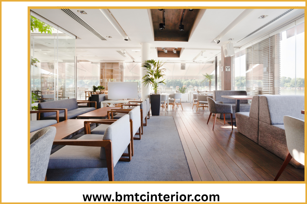Interior of a stylish and compact cafe in Oman, showcasing smart space planning and design elements.