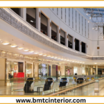 Here are a few options for descriptive ALT text, catering to slightly different focuses, for your image: **Option 1 (Focus on general aesthetics and location):** > "A bright and inviting small shop interior in Muscat, showcasing modern design with clean lines and natural light, creating a sense of spaciousness." **Option 2 (Focus on specific design elements if visible):** > "Chic and functional small shop interior design in Muscat, featuring minimalist shelving, a well-lit display area, and strategic use of neutral colors to maximize perceived space." **Option 3 (More concise and direct):** > "Inspiring small shop interior design ideas for Muscat, emphasizing smart space utilization and a welcoming atmosphere." **Option 4 (If the image shows a specific type of shop, e.g., boutique):** > "Elegant boutique interior design in Muscat, with clever space-saving solutions and a stylish aesthetic to enhance the shopping experience." **Key elements these ALT texts include:** * **What it is:** "small shop interior" * **Location (if relevant and visible):** "in Muscat" * **Key theme/purpose:** "better space," "spaciousness," "space utilization," "maximize perceived space" * **Descriptive adjectives:** "bright," "inviting," "modern," "clean lines," "natural light," "chic," "functional," "minimalist," "well-lit," "strategic," "neutral colors," "inspiring," "welcoming," "elegant," "clever," "stylish" **To choose the best one, consider:** * **What is most prominent in the image?** If there are specific furniture pieces or color palettes, you might lean towards Option 2. * **What is the primary message of your post?** If it's broadly about making small spaces feel bigger, Option 1 or 3 might be best. * **Your target audience:** Are they looking for general inspiration or specific design tips? **Ultimately, the goal is to provide a concise yet informative description that helps someone who cannot see the image understand its content and its relevance to your post.**