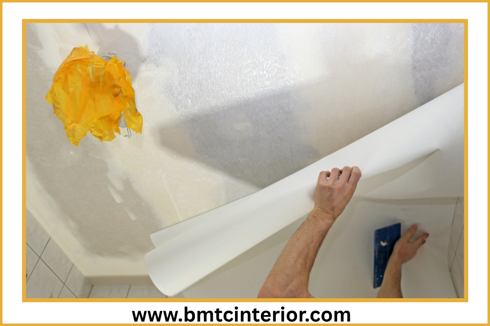 Wallpaper installation on an interior feature wall