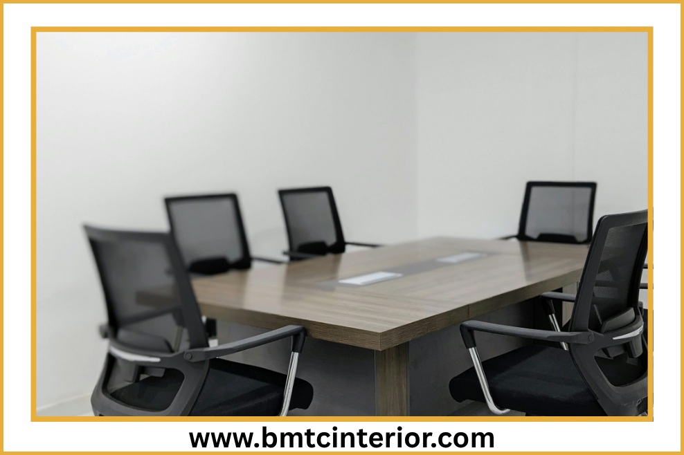 Office desks and seating installed in a fitted office interior