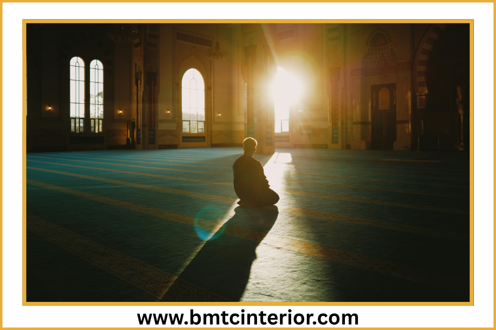 Calm prayer room interior design with soft lighting and qibla wall in Oman